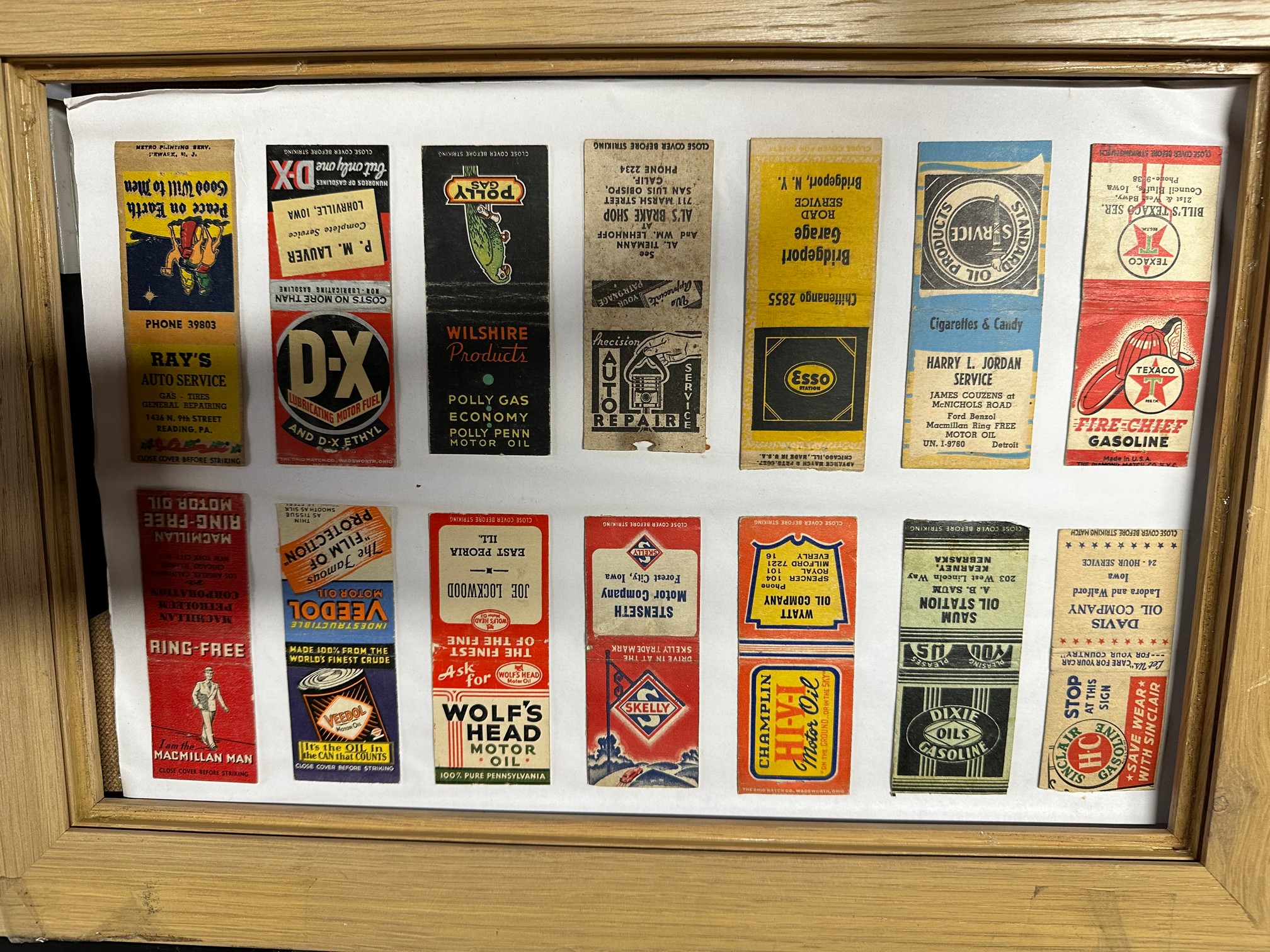 A selection of framed prints etc. to include American petrol and oil branded match packs, CAV - Image 4 of 7