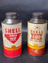 A Shell X-100 Motor Oil pint oil can and a Shell Spirax 90EP pint oil can.