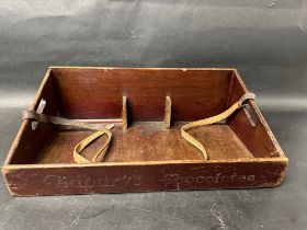 A Cadbury's Chocolates wooden usherette tray with adjustable leather neck strap and integral carry