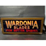 A Wardonia Blades 'For Better Shaves' lightbox, 21 1/2" wide x 9" tall x 10 1/2" deep.