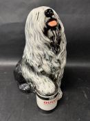 A Beswick pottery depicting an Old English Sheepdog with its right paw upon a tin of ICI Dulux Gloss