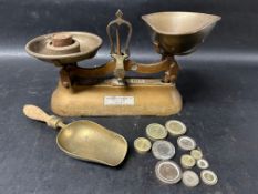 A set of weighing scales and associated weights and scoop, with 'The Albion Foundry Ltd. Tipton,