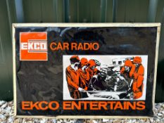 An unusual celluloid (or plastic) advertising sign for Ekco Car Radios titled: Ekco Entertains,