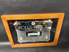 An older reproduction Rolls-Royce advertising mirror 20 3/4 x 14 1/2" and a Coca-Cola tray.