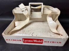 A Lyons Maid wooden ice cream usherette tray with contemporary ice cream props for display purposes,