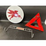 A Pegasus disc, 12" diameter, a warning triangle and a JWP Service Tools Brake Bleeder wall