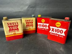 Four Shell S-100 Motor Oil cans.