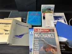 A Concorde related collection including press cuttings, a tribute calendar, a blank Concorde