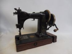 A Wheeler & Wilson sewing machine, model no. 9-H-4, circa 1904, serial no. 2779432.