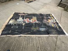 A large canvas depicting an American road scene with hotels, restaurants etc. wiring for car lights