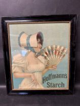 A framed and glazed Hoffmann's Starch showcard depicting a lady holding a fan, 20 1/4 x 23".