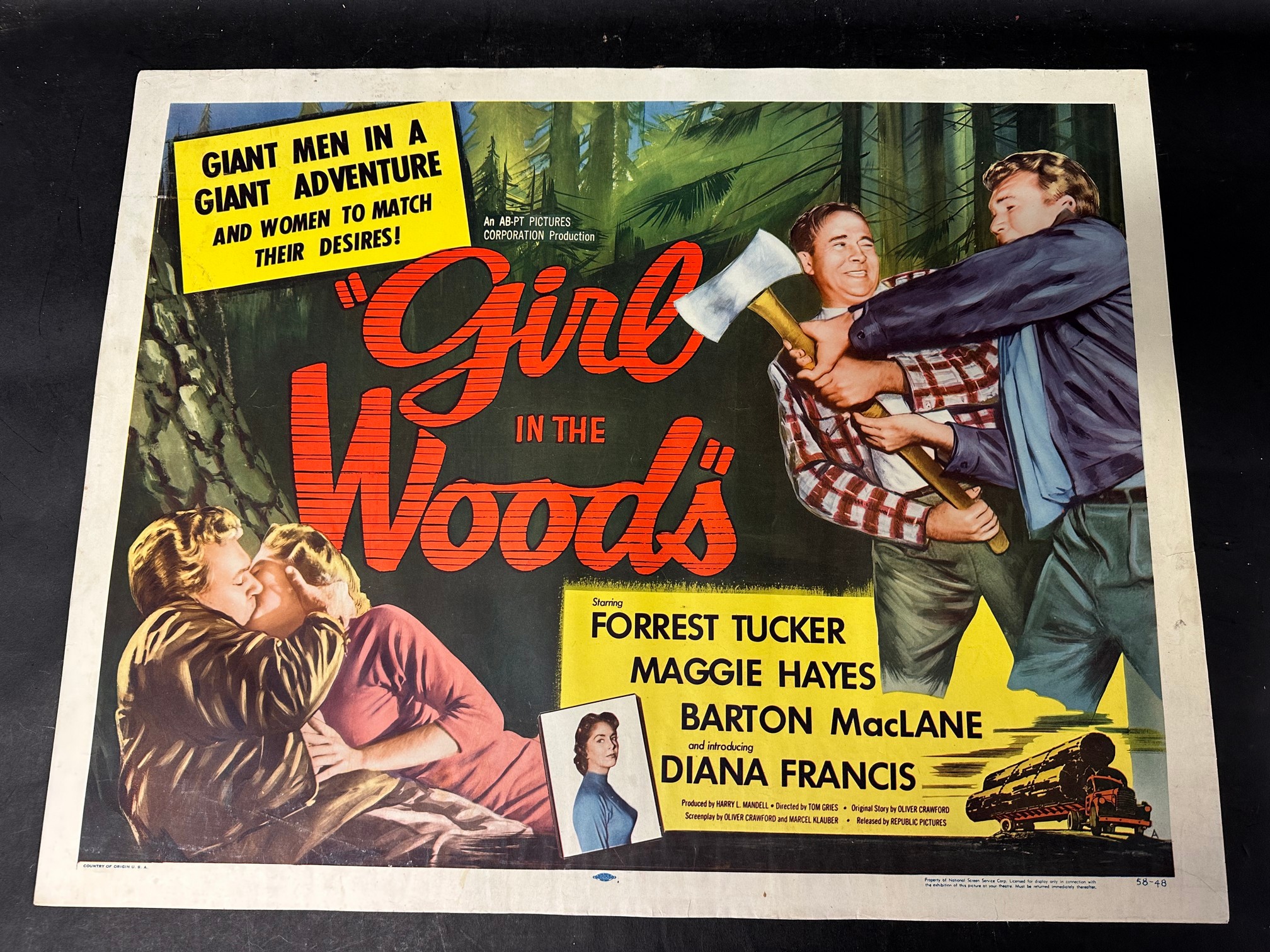 An original USA film poster for AB-PT's Girls in The Woods starring Forrest Tucker, Maggie Hayes,