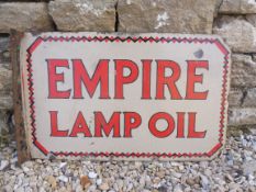 An Empire Lamp Oil double sided enamel sign with hanging flange, 24 x 15".