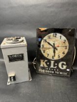 A K.L.G Plugs Smith sectric wall clock (see damage in images) and a Lodge Spark Plug Cleaner.