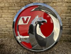 A large Vauxhall plastic showroom lightbox front cover with damage to lower edge, 55" diameter.