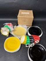 Two 1960s Welware picnicware sets each comprising four cups, four saucers and four tea plates. One