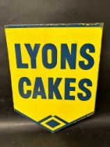 A Lyons Cake double sided enamel advertising sign with hanging flange, 12 1/4 x 15 1/2".
