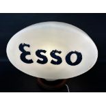 An Esso Extra glass petrol pump globe by Hailware, damage to neck (hidden within rubber ring).