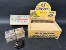 A complete set of 12 Sunshine Gasfilled Auto Head Lamps in original shop display box, a complete
