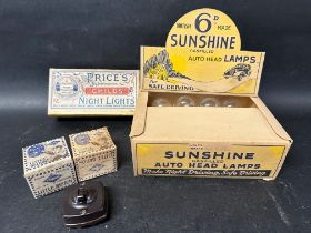 A complete set of 12 Sunshine Gasfilled Auto Head Lamps in original shop display box, a complete