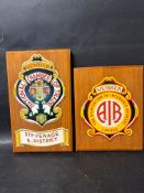 An AIB member plaque mounted on wood, The association of Insurance Brokers Limited, 8 1/4 x 10 1/