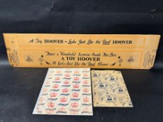 A 1920s/1930s box for a toy hoover 'Hoover Toy Sweeper', with superb illustrations of a girl pushing