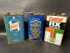A Wakefield Castrol Motor Oil can, a Smiths Bluecol Anti-freeze gallon can and a Castrol RX Super