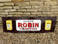 An enamel sign advertising Ogden's Robin Cigarettes, painted brown to verso, 60 1/4 x 18".
