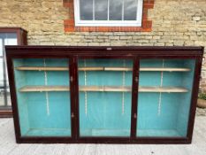 A large glazed wall mounting display cabinet with adjustable height shelves, plaque for Potters (