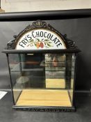 A chocolate shop display cabinet with two glass shelves with Fry's pediment to top and J.S. Fry &