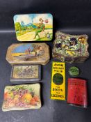 An oval Dick Wittington themed postbox moneybox, a Dick Wittington biscuit tin, an Avon polish tin