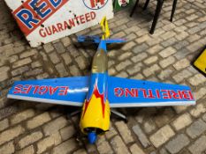 A radio controlled model aeroplane with Breitling Eagle 04 livery. Circa 140cm L x 157 cm