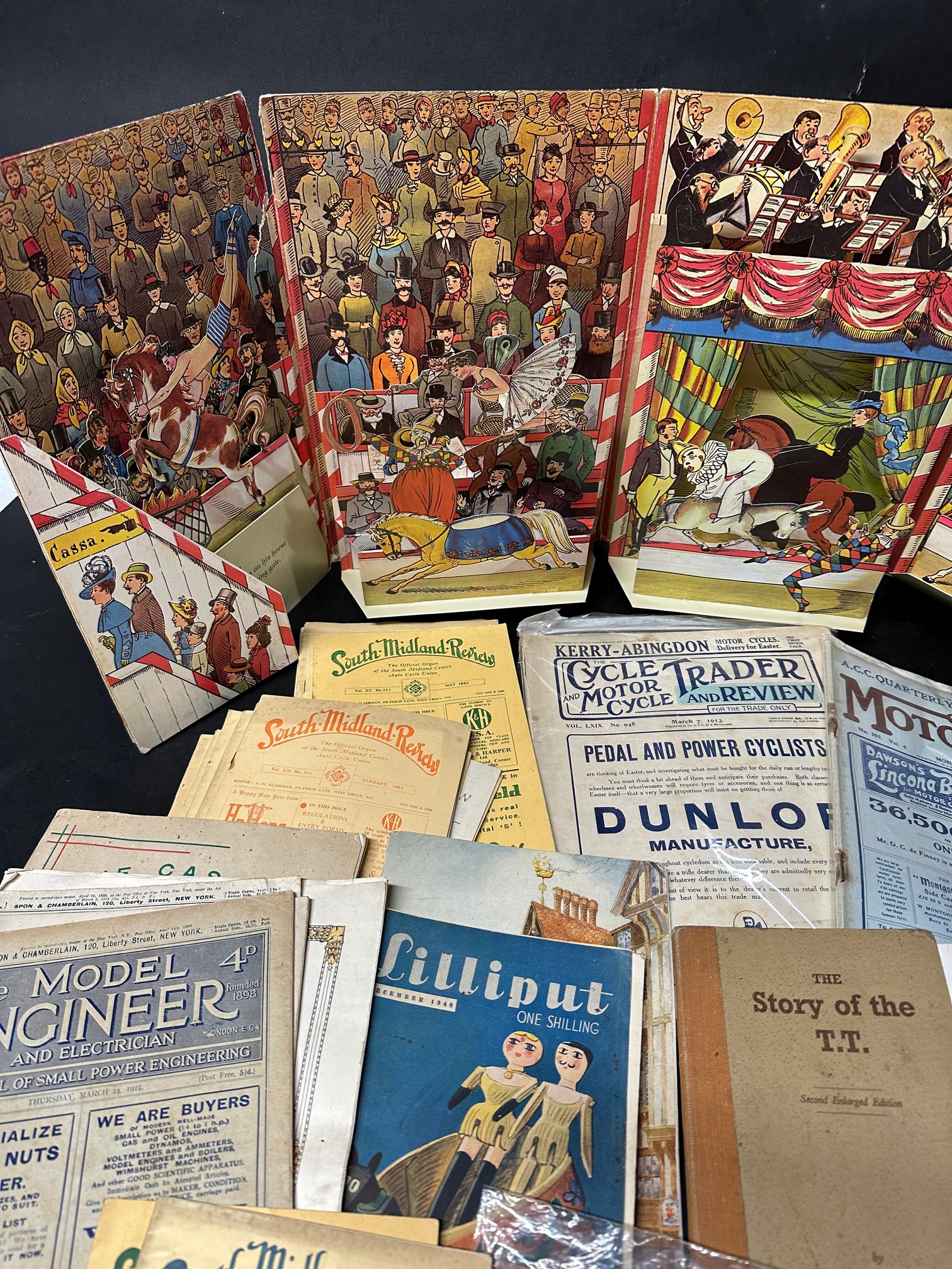 An interesting lot of books and ephemera including a Tom Webster's 1922 annual, International Circus - Image 2 of 6