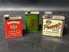 A Propert's Oil for waterproofing boots & shoes, a Jones Sewing Machines tin with cork stopper and a