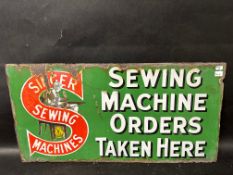 A Singer Sewing Machines double sided enamel advertising sign, 22 x 11".