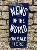 A News of The World On Sale Here rectangular enamel sign, 12 x 30".