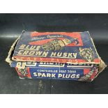 A shop counter dispensing box for Blue Crown Husky Spark Plugs.