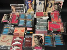 A selection of 1940s and later hair accessories including clips, slides, curlers, wave clips, bob