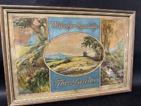 A Wills ''Three Castles'' Cigarettes showcard depicting a deers in a moorland scene, framed and