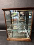 A Fry's Choice Chocolate cabinet, 23 1/2