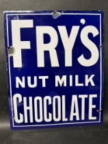 A Fry's Chocolate Nut Milk enamel advertising sign with several patches of restoration, see