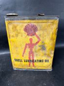 An early Shell Lubricating Oil Triple Shell (Heavy) one gallon can depicting Robotman / Stickman and
