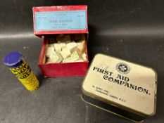 A box of wartime erasers, a Battle's Handy Marking Stick for branding pigs, sheep and cattle and a