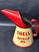 A half gallon oil pourer with Shell Rotella Oil decals.