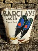 A Barclay's Lager 'Light or Dark' curved enamel advertising sign, 19 1/2 x 29 1/2".