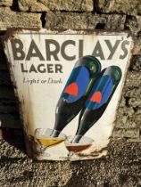 A Barclay's Lager 'Light or Dark' curved enamel advertising sign, 19 1/2 x 29 1/2".