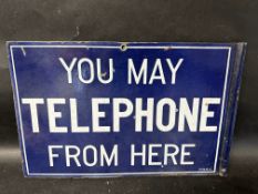 A 'You May Telephone From Here double sided enamel bracket sign, marked F.B.E.C. to bottom right