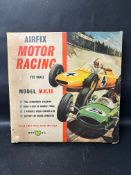 An Airfix Motor Racing set in 1/32 scale, Model M.R.15, 21 1/2 x 21 1/2" (unchecked).