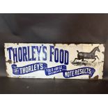 A Thorley's Food pictorial enamel advertising sign by Wood & Penfold