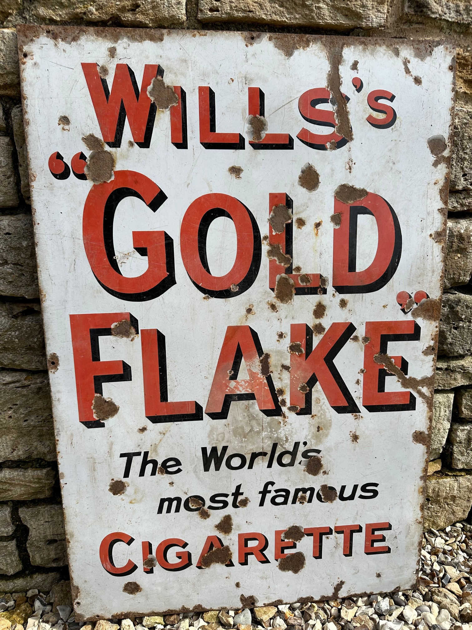A Wills's "Gold Flake" The World's most famous Cigarette enamel advertising sign, 24 x 36".
